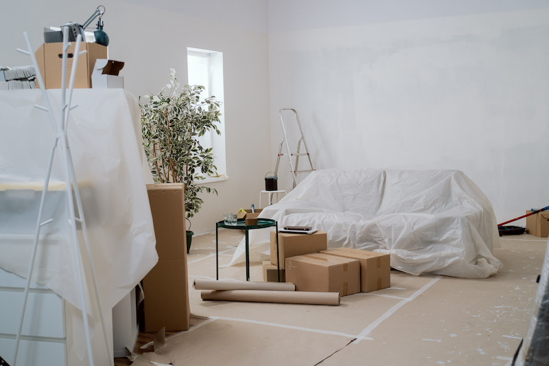 Use blankets, cardboard, or foam padding to cover floors and walls